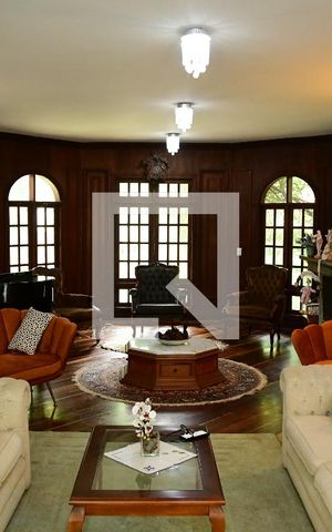 Casa de condomínio para alugar com 1350m², 4 quartos e 7 vagasSala