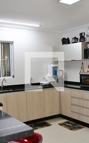 Casa à venda com 322m², 4 quartos e 4 vagas Casa à venda com 322m², 4 quartos e 4 vagasCozinha