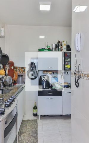 Apartamento à venda com 60m², 3 quartos e 1 vaga Apartamento à venda com 60m², 3 quartos e 1 vagaCozinha e Área de Serviço