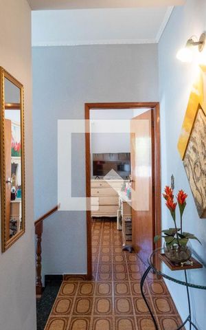 Casa à venda com 125m², 2 quartos e 2 vagas Casa à venda com 125m², 2 quartos e 2 vagasBanheiro Corredor