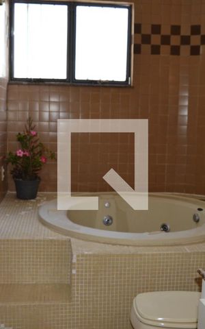 Casa à venda com 419m², 4 quartos e 4 vagasBanheiro da Suite