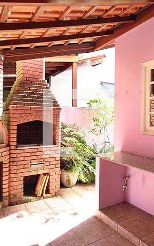 Casa de condomínio à venda com 165m², 2 quartos e 2 vagasChurrasqueira