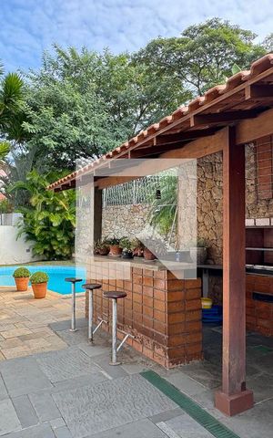 Casa de condomínio à venda com 400m², 5 quartos e 4 vagasChurrasqueira