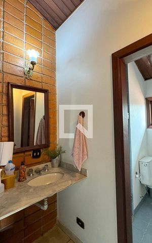 Casa de condomínio à venda com 400m², 5 quartos e 4 vagasBanheiro Corredor