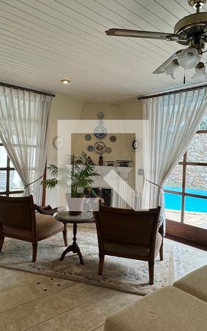Casa de condomínio à venda com 400m², 5 quartos e 4 vagasSala