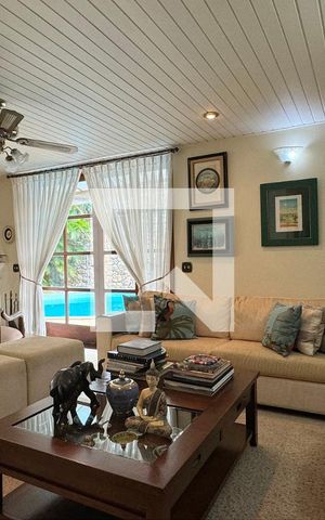 Casa de condomínio à venda com 400m², 5 quartos e 4 vagasSala