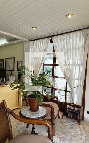 Casa de condomínio à venda com 400m², 5 quartos e 4 vagasSala