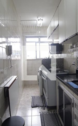 Apartamento à venda com 57m², 2 quartos e 1 vaga Apartamento à venda com 57m², 2 quartos e 1 vagaCozinha e Área de Serviço