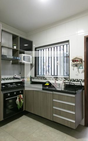 Casa à venda com 103m², 3 quartos e 2 vagas Casa à venda com 103m², 3 quartos e 2 vagasCozinha