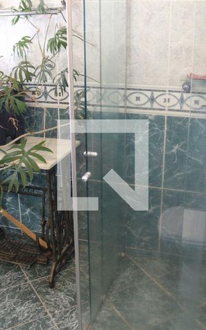 Casa à venda com 320m², 4 quartos e 4 vagasBanheiro 2