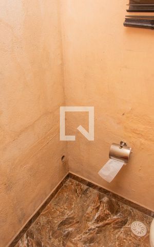 Casa à venda com 180m², 2 quartos e 2 vagasBanheiro (área da churrasqueira)