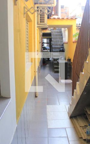 Casa à venda com 145m², 3 quartos e 2 vagasCorredor da lavanderia e área gourmet