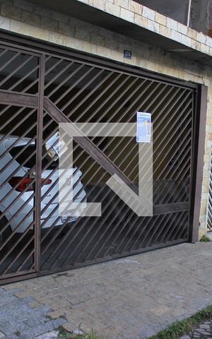 Casa à venda com 145m², 3 quartos e 2 vagasFachada com placa QuintoAndar