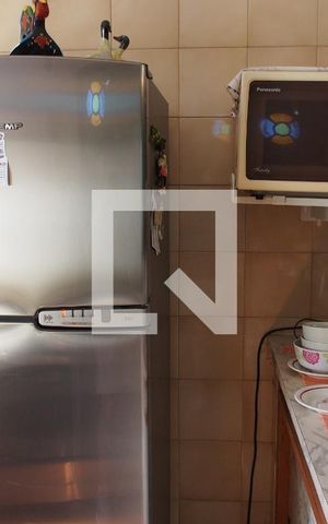 Casa à venda com 283m², 5 quartos e 6 vagasCozinha e Área de Serviço