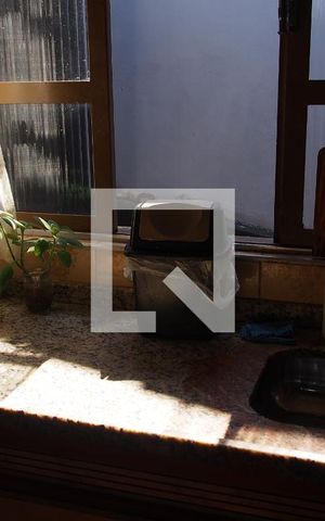 Casa à venda com 283m², 5 quartos e 6 vagasCozinha e Área de Serviço