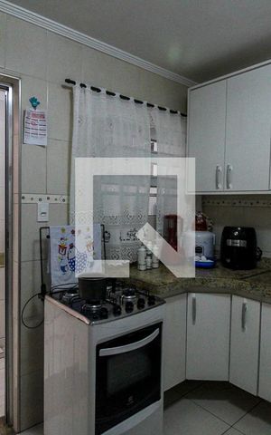 Casa à venda com 64m², 2 quartos e 2 vagas Casa à venda com 64m², 2 quartos e 2 vagasCozinha