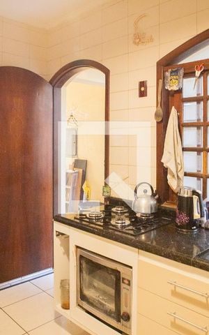 Casa à venda com 250m², 3 quartos e 3 vagas Casa à venda com 250m², 3 quartos e 3 vagasCozinha
