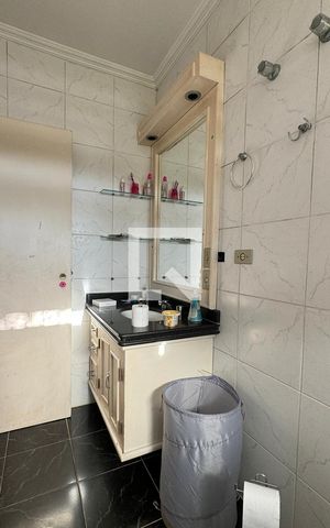 Casa de condomínio à venda com 350m², 4 quartos e 5 vagasBanheiro da Suíte 4