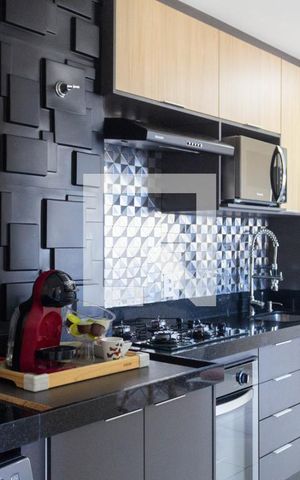 Apartamento à venda com 40m², 2 quartos e 1 vaga Apartamento à venda com 40m², 2 quartos e 1 vagaCozinha e Área de Serviço