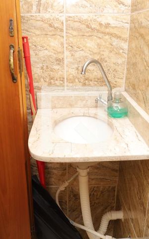 Casa à venda com 158m², 3 quartos e 4 vagasBanheiro na área de serviço