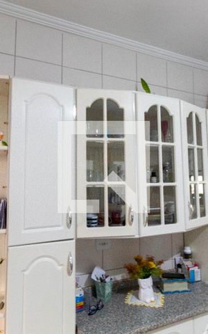 Casa à venda com 134m², 2 quartos e 1 vaga Casa à venda com 134m², 2 quartos e 1 vagaCozinha - Armários