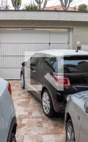 Casa à venda com 350m², 4 quartos e 5 vagas Casa à venda com 350m², 4 quartos e 5 vagasGaragem