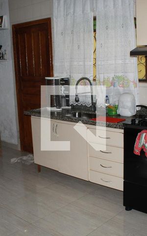 Casa para alugar com 120m², 2 quartos e 2 vagasCozinha