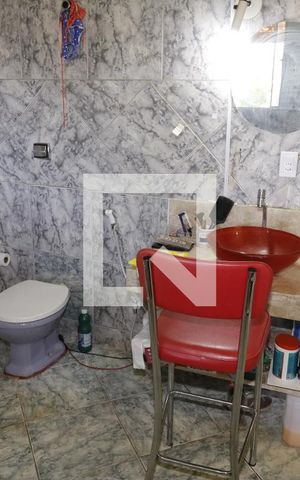 Casa de condomínio à venda com 1000m², 4 quartos e 5 vagasBanheiro do Quarto 1