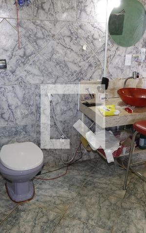 Casa de condomínio à venda com 1000m², 4 quartos e 5 vagasBanheiro do Quarto 1