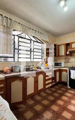 Casa à venda com 450m², 3 quartos e 8 vagas Casa à venda com 450m², 3 quartos e 8 vagasCozinha