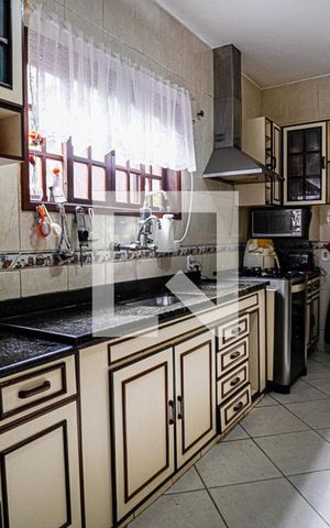 Casa à venda com 600m², 3 quartos e 3 vagas Casa à venda com 600m², 3 quartos e 3 vagasCozinha