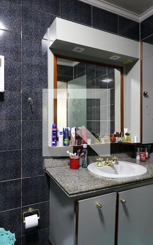 Casa à venda com 452m², 4 quartos e 12 vagasBanheiro da Suíte 4