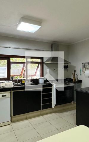Casa de condomínio à venda com 430m², 4 quartos e 6 vagasCozinha