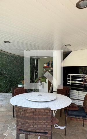 Casa de condomínio à venda com 430m², 4 quartos e 6 vagasChurrasqueira
