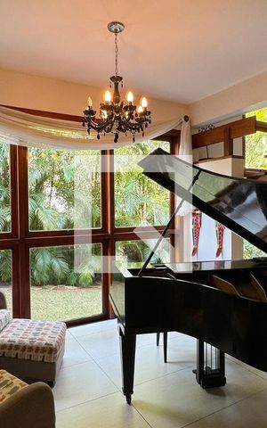 Casa de condomínio à venda com 430m², 4 quartos e 6 vagasSala
