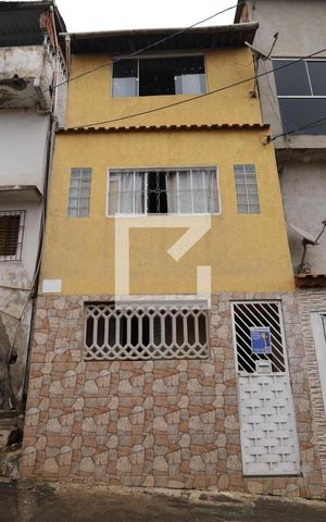 Casa à venda com 27m², 3 quartos e sem vagaFachada do imóvel (Placa instalada no portão)