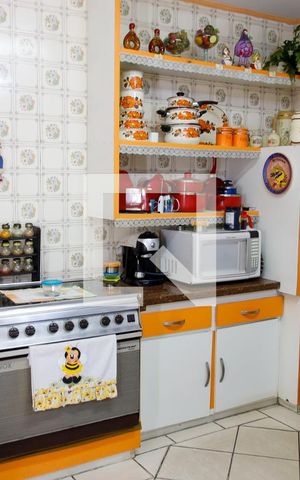 Casa à venda com 260m², 3 quartos e sem vaga Casa à venda com 260m², 3 quartos e sem vagaCozinha