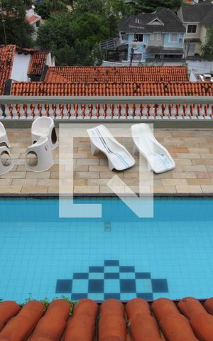 Casa de condomínio à venda com 480m², 4 quartos e 3 vagasVaranda da sala - Vista