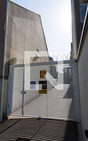 Casa de condomínio para alugar com 164m², 3 quartos e 2 vagasPortão da garagem - plaquinha