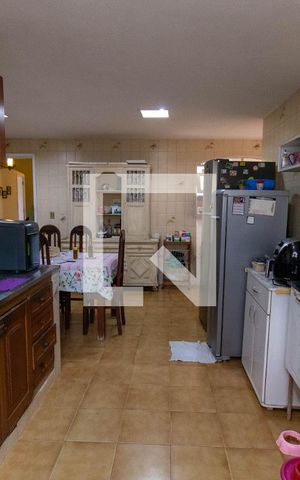 Casa à venda com 710m², 4 quartos e 4 vagas Casa à venda com 710m², 4 quartos e 4 vagasCozinha