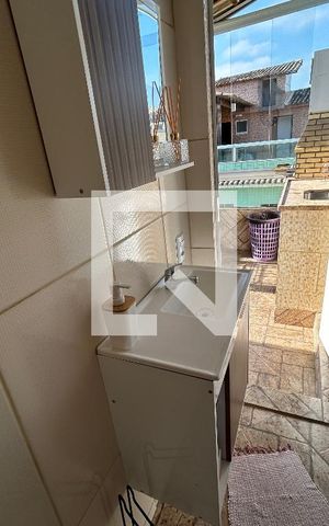 Casa de condomínio à venda com 68m², 2 quartos e 1 vagaBanheiro do terraço