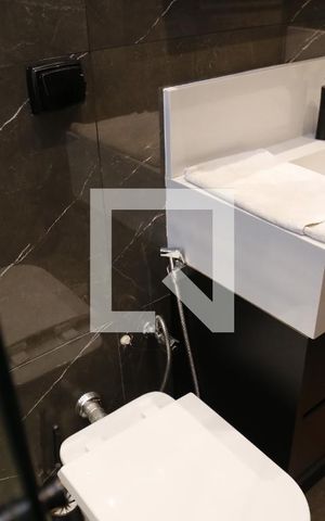 Casa de condomínio à venda com 350m², 3 quartos e 4 vagasBanheiro da Suíte 1