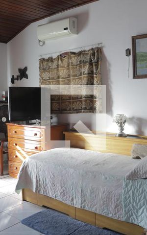 Casa à venda com 350m², 5 quartos e 2 vagasSala de TV