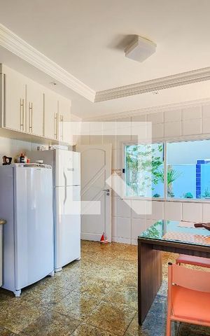 Casa de condomínio para alugar com 327m², 4 quartos e 4 vagasCozinha
