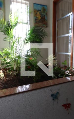 Casa à venda com 400m², 3 quartos e 12 vagasCorredor e Escada