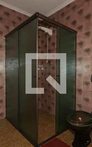 Casa à venda com 400m², 3 quartos e 12 vagasBanheiro da Suíte 1