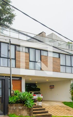 Casa de condomínio à venda com 287m², 3 quartos e 4 vagas Casa de condomínio à venda com 287m², 3 quartos e 4 vagasFachada