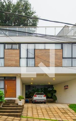 Casa de condomínio à venda com 287m², 3 quartos e 4 vagas Casa de condomínio à venda com 287m², 3 quartos e 4 vagasFachada