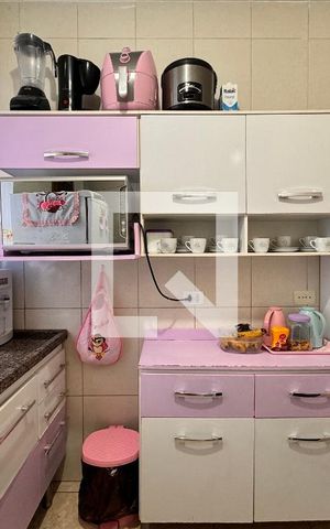 Casa à venda com 80m², 2 quartos e 2 vagas Casa à venda com 80m², 2 quartos e 2 vagasCozinha