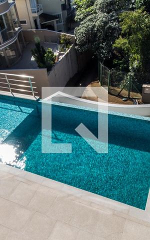 Casa de condomínio à venda com 540m², 4 quartos e 4 vagas Casa de condomínio à venda com 540m², 4 quartos e 4 vagasVista da Suíte